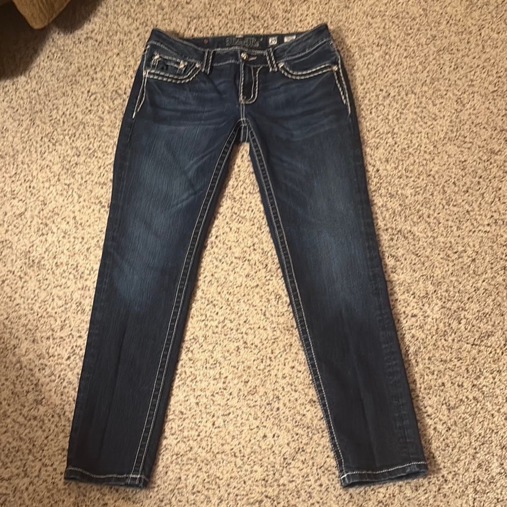 STEAL of a deal! Miss Me Like New Low Rise Skinny Jeans with Contrast Stitching